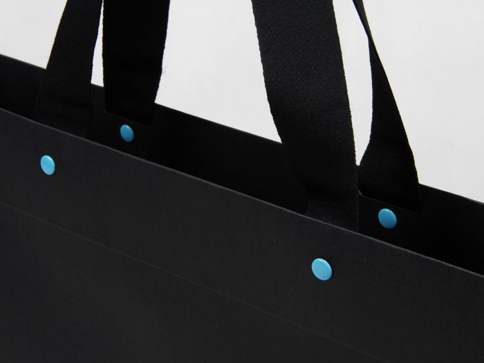 Luxury Leather Goods Paper Bag Rivet Handle