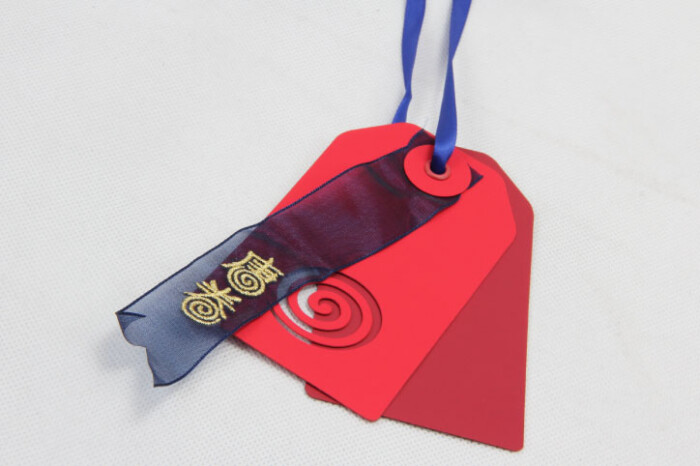 Embroidering Hang Tag with Die Cut Logo